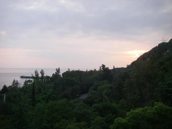 На закате.