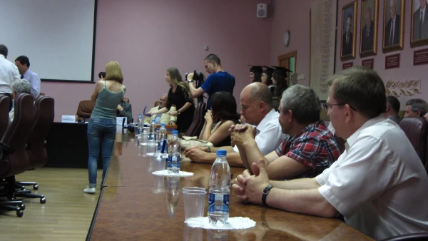 попечители