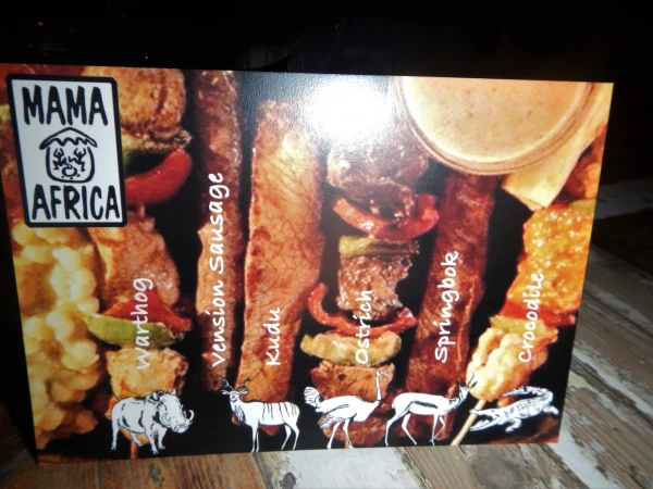 Ресторан " Mama Africa". Мясо гриль диких животных предлагается