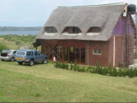 Glass and Grass House 