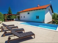 Four-Bedroom Holiday home Jurdani with a Fireplace 08 