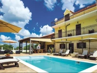 Five-Bedroom Holiday home with a Fireplace in Unesic 