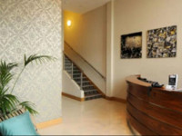 Carrick Plaza Suites